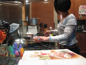 Julie at the cooktop